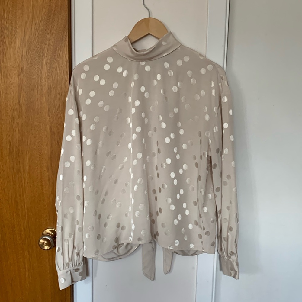 Champagne coloured high neck  open back shirt